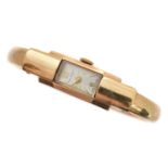 A 9ct gold Olma watch bangle,