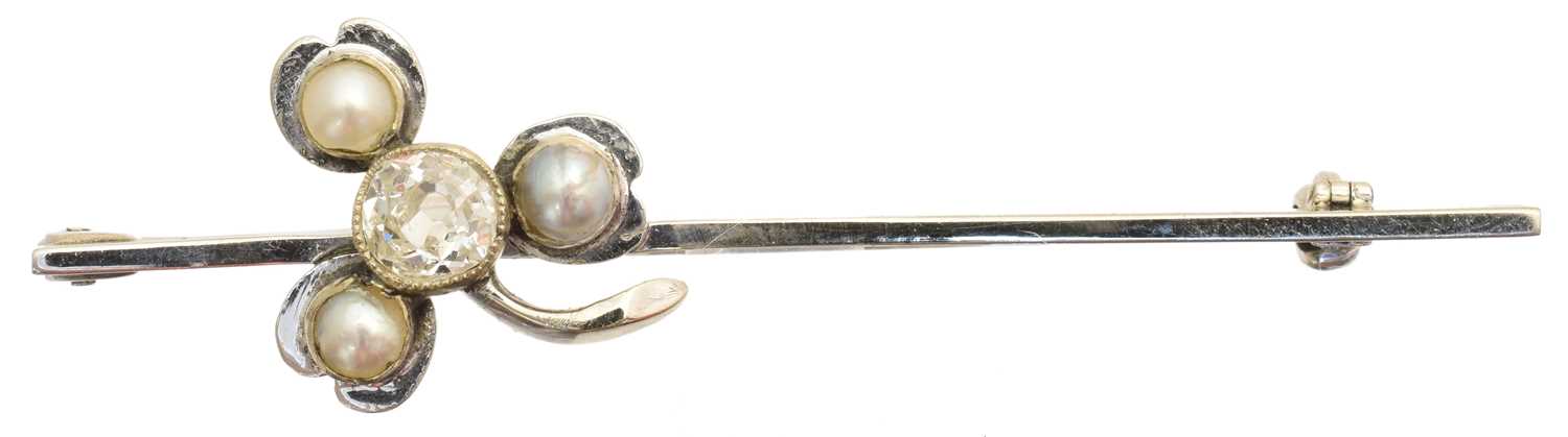 An early 20th century diamond and split pearl bar brooch,