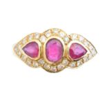 An 18ct gold ruby and diamond cluster ring,