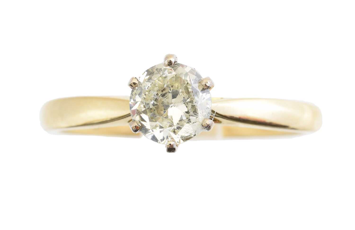 An 18ct gold diamond single stone ring,