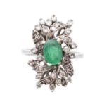 An emerald and diamond cluster ring,