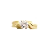 An 18ct gold diamond single stone ring,