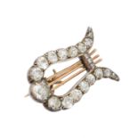 A Victorian diamond lyre brooch,