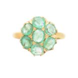 An emerald cluster ring,