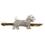 A diamond dog brooch,