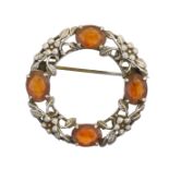 An Arts & Crafts style citrine brooch,