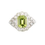 A peridot and diamond cluster ring,