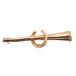 An early 20th century hunting horn brooch,