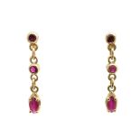 A pair of 14ct gold ruby drop earrings,