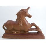 A 19th century salt glaze flat back model, of a unicorn from the royal arms, height 11.5insCondition
