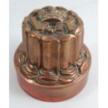 A Benham & Froud copper jelly mould, with VR and crown to the top, numbered 550, registered number