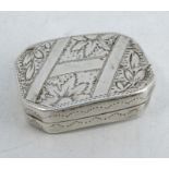 A Georgian silver vinaigrette, of rectangular form with canted corners and engraved decoration,