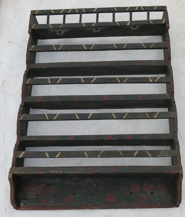 A painted continental narrow Delft rack, decorated with tulips to the side stiles, width 36ins