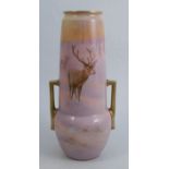 A Royal Worcester vase, decorated with a stag and hind in a snowy pink landscape and ground by Harry