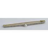 An Austrian diamond and pearl line brooch, control marks to the mount and pin, the 4.3mm diameter