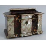A Victorian tortoiseshell and mother of pearl tea caddy, with caddy top and serpentine front, the