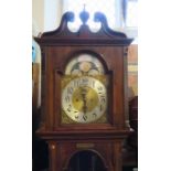 A mahogany cased long case clock, the brass dial with silvered chapter ring and moon phase above