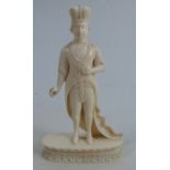A 19th century carved ivory figure, of a regal man wearing a crown and clock, on a base, height 4.