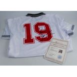 A Paul Gascoigne signed England shirt, Number 19, with certificateCondition Report: Adult size -