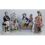 Four Staffordshire pottery figures, to include Smuggler Quarrel and Louis Napoleon, height 12ins and