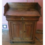 A 19th century child's tray top wash stand cupboard, with drawer over a pair of cupboard doors,