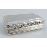 A Georgian silver table snuff box, of rectangular form with engine turned top and base, with