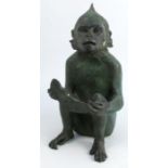 A 20th century patinated bronze model, of a seated monkey holding a slice of food, A&R mark,