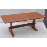 Alan Grainger Acorn Man, an oak rectangular refectory style dining table, raised on end supports