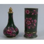 A 19th century Spode cylindrical vase, decorated with purple leaves to a green ground, height