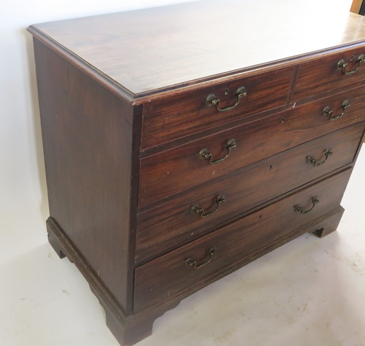 A 19th century mahogany chest, of two short over three long graduated drawers, raised on bracket - Image 3 of 3