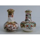 Two 19th century Spode porcelain bottles with stoppers, both embossed with a bird to the neck and