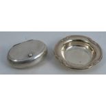 An oval silver snuff box, Chester 1908, weight 1oz, diameter 3ins, together with a circular