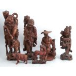 Four Oriental root carvings, of male figures, height of tallest 13.5ins, together with two other