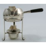 A silver brandy pan and warmer,  the pan with ebonised handle, numbered 13116, raised on a