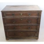 An Antique oak chest, of four long graduated drawers, with moulded fronts, width 36.5ins, height