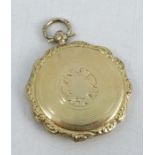 A 19th century French silver gilt pocket watch vinaigrette, of circular form with shaped edge, being