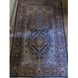An Eastern prayer rug, 61ins x 36ins