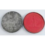A Victorian wax seal, dated 1853, in a tin, af, diameter 4ins