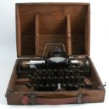 A No. 5 Blickensderfer Newcastle-On-Tyne Made in U.S.A typewriter, in a wooden case, together with a