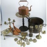 A collection of metalware, to include two large copper sauce pans, two pierced brass fire side