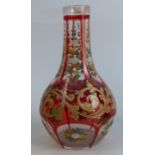 A 19th century Bohemian glass huqqa base, with ruby flashing and enamelling, height 8insCondition