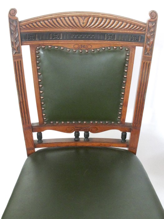 A set of six oak dining chairs, stamped Thos. Edwards & Sons, with carved and upholstered backs, - Image 2 of 3
