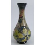 A Moorcroft pottery baluster vase, decorated in the Hypericum pattern, height 6.75insCondition