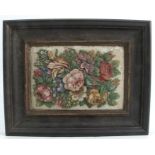 A 19th century Italian micro mosaic framed rectangular panel, decorated with a floral spray, 4.