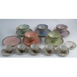 A 20th century Japanese porcelain part tea service, comprising five cups and six saucers,