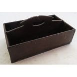 An oak two division cutlery tray, with central intregal handle, 15ins x 9ins