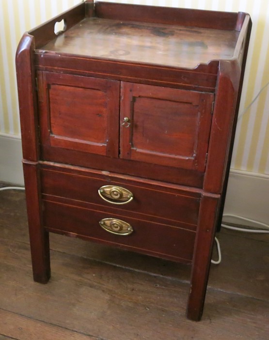 A Georgian mahogany tray top commode, the gallery top with integral handles, fitted with a