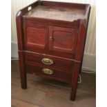 A Georgian mahogany tray top commode, the gallery top with integral handles, fitted with a