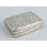 A 19th century silver vinaigrette, of rectangular form, with engraved decoration to all sides,