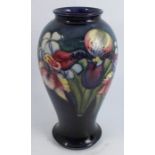 A Moorcroft pottery baluster shaped vase, decorated in the Orchid pattern, height 10.5insCondition